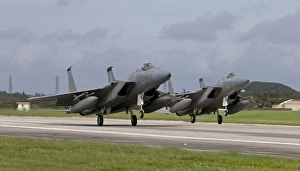 Two F-15s come in for a landing at Kadena Air Base, Okinawa, Japan Two F-15s come in for a landing at Kadena Air Base, Okinawa, Japan
