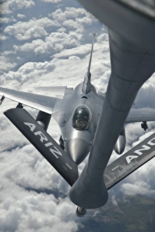 An F-16 from Colorado Air National Guard refuels from a U An F-16 from Colorado Air National Guard refuels from a U