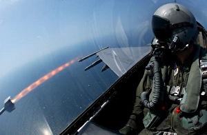 An F-16 Fighting Falcon fires an AIM-9 missile An F-16 Fighting Falcon fires an AIM-9 missile