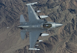 An F-16 Fighting Falcon on a training mission over Arizona An F-16 Fighting Falcon on a training mission over Arizona