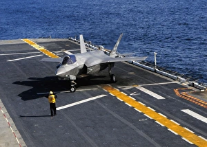 An F-35B Lightning II makes a vertical landing on the flight deck of USS Wasp An F-35B Lightning II makes a vertical landing on the flight deck of USS Wasp
