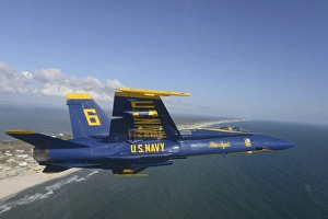 An F/A-18 Hornet from the Blue Angels flies a training sortie An F/A-18 Hornet from the Blue Angels flies a training sortie