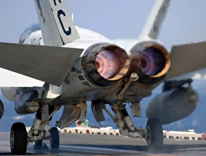 An F/A-18A+ Hornet launches off the flight deck of USS Harry S. Truman An F/A-18A+ Hornet launches off the flight deck of USS Harry S. Truman