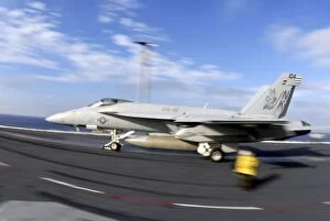Images Dated 15th March 2005: An F / A-18C Hornet launches from the flight deck aboard USS Nimitz