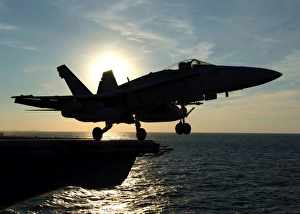 An F/A-18C Hornet launches from the flight deck of USS Enterprise An F/A-18C Hornet launches from the flight deck of USS Enterprise