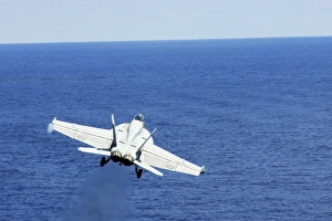 An F/A-18E Hornet taking off from USS George Washington An F/A-18E Hornet taking off from USS George Washington