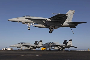 An F/A-18E Super Hornet comes in for an arrested landing An F/A-18E Super Hornet comes in for an arrested landing