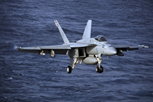 An F/A-18E Super Hornet prepares to make an arrested landing An F/A-18E Super Hornet prepares to make an arrested landing