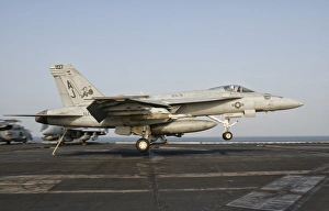 An F/A-18E Super Hornet trap landing aboard USS George H.W. Bush An F/A-18E Super Hornet trap landing aboard USS George H.W. Bush
