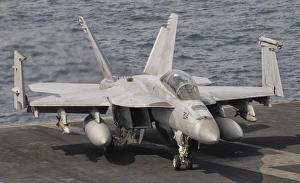 An F/A-18F Super Hornet is ready for a mission over Iraq An F/A-18F Super Hornet is ready for a mission over Iraq