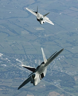 Two F/A-22 Raptor aircraft prepare for refueling Two F/A-22 Raptor aircraft prepare for refueling