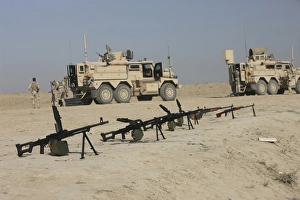 Firearms sit ready on a firing range in Kunduz, Afghanistan Firearms sit ready on a firing range in Kunduz, Afghanistan