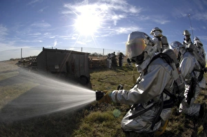 Firefighters participate in a fire training exercise Firefighters participate in a fire training exercise