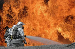 Prints of May 23, 2007 - Firemen neutralize a fire during a field training exercise at Shaw Air Force Base, South Carolina Drill Prints: Firemen Neutralize a Fire Print, Shaw Air Force Base