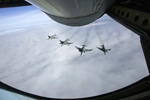 Formation of Luftwaffe F-4F Phantom IIs behind a tanker Formation of Luftwaffe F-4F Phantom IIs behind a tanker