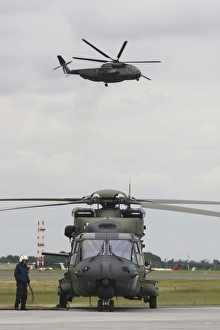 A German Army NH90 and its predecessor, the CH-53 Sea Stallion A German Army NH90 and its predecessor, the CH-53 Sea Stallion