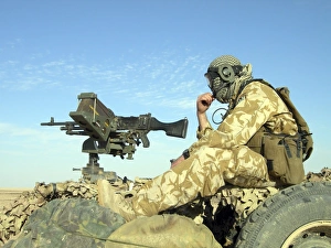 A gunner sits atop a British Army WMIK Land Rover A gunner sits atop a British Army WMIK Land Rover