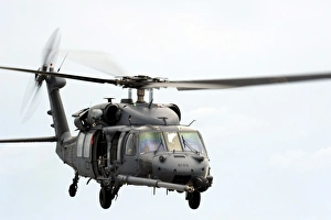 An HH-60 Pave Hawk helicopter conducts search and rescue operations An HH-60 Pave Hawk helicopter conducts search and rescue operations
