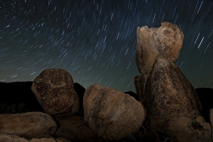 Huge granite boulders under starry skies, California Huge granite boulders under starry skies, California