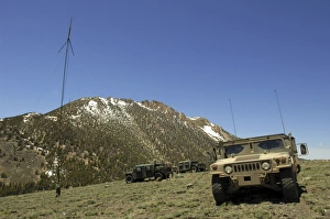 A Humvee is parked at the re-transmitting site at the Mountain Warfare Training Center A Humvee is parked at the re-transmitting site at the Mountain Warfare Training Center