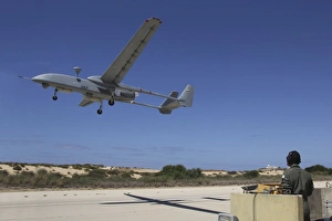 An IAI Heron Unmanned Aerial Vehicle takes off the runway An IAI Heron Unmanned Aerial Vehicle takes off the runway