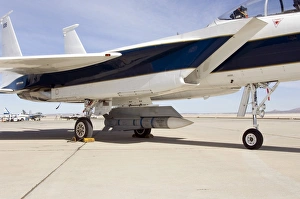 An inert AIM-54 Phoenix missile nestled under the fuselage of NASA Drydens F-15B An inert AIM-54 Phoenix missile nestled under the fuselage of NASA Drydens F-15B