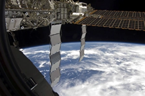 International Space Station backdropped againts a blue and white Earth International Space Station backdropped againts a blue and white Earth