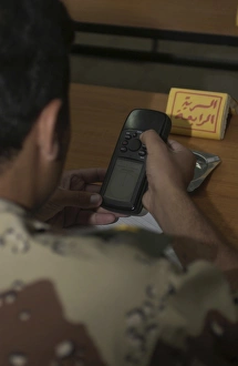 An Iraqi Army lieutenant learns how to use a handheld GPS device An Iraqi Army lieutenant learns how to use a handheld GPS device