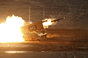 An Israel Defense Force Artillery Core MLRS launches a rocket An Israel Defense Force Artillery Core MLRS launches a rocket
