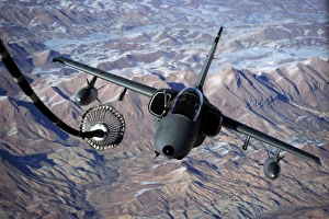 An Italian AMX approaches a KC-10A Extender to refuel over Afghanistan An Italian AMX approaches a KC-10A Extender to refuel over Afghanistan