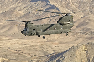 Italian Army CH-47C Chinook helicopter in flight over Afghanistan Italian Army CH-47C Chinook helicopter in flight over Afghanistan