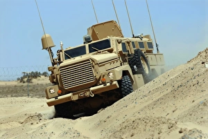 The Joint Explosive Ordnance Disposal Rapid Response Vehicle navigates over rough terrain The Joint Explosive Ordnance Disposal Rapid Response Vehicle navigates over rough terrain