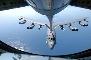 A KC-135 Stratotanker refuels a B-52 Stratofortress over the Indian Ocean A KC-135 Stratotanker refuels a B-52 Stratofortress over the Indian Ocean