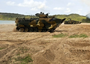 Korean amphibious assault vehicles moving across the beach during a simulated amphibious Korean amphibious assault vehicles moving across the beach during a simulated amphibious