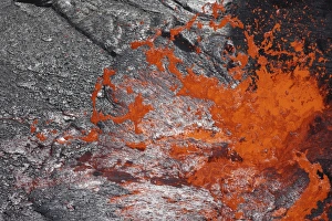 Lava bubble bursting through crust of active lava lake, Erta Ale volcano, Danakil Depression Lava bubble bursting through crust of active lava lake, Erta Ale volcano, Danakil Depression