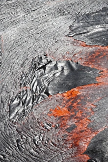 Lava flowing out of active lava lake, Erta Ale volcano, Danakil Depression, Ethiopia Lava flowing out of active lava lake, Erta Ale volcano, Danakil Depression, Ethiopia