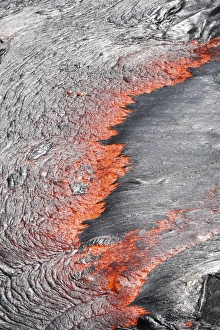 Lava flowing from under crust of lava lake, Erta Ale volcano, Danakil Depression Lava flowing from under crust of lava lake, Erta Ale volcano, Danakil Depression