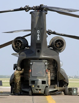 Loading of relief supplies into a CH-47 Chinook Loading of relief supplies into a CH-47 Chinook