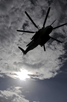 Low angle view of a CH-53E Super Stallion helicopter in flight Low angle view of a CH-53E Super Stallion helicopter in flight