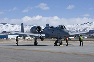 Maintenance crews perform end of runway checks on an A-10 Thunderbolt Maintenance crews perform end of runway checks on an A-10 Thunderbolt