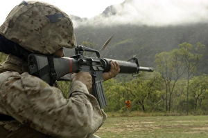 A Marine conducts drills with an M16-A2 service rifle A Marine conducts drills with an M16-A2 service rifle