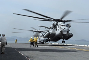 A Marine MH-53 helicopter takes off from the flight deck of USS Essex A Marine MH-53 helicopter takes off from the flight deck of USS Essex