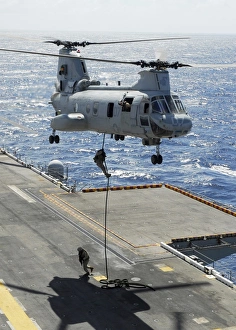 Marines perform fast-rope training exercises from a CH-46E Sea Knight helicopter Marines perform fast-rope training exercises from a CH-46E Sea Knight helicopter