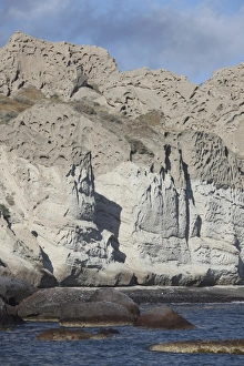 Massive weathered tuff deposits along the south coast of Santorini, Greece Massive weathered tuff deposits along the south coast of Santorini, Greece
