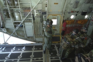 Members of the Pathfinder Platoon await to jump from a Royal Air Force C-130 Hercules Members of the Pathfinder Platoon await to jump from a Royal Air Force C-130 Hercules
