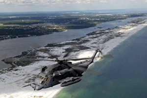 An MH-53 Pave Low flies over the coastline of Florida An MH-53 Pave Low flies over the coastline of Florida
