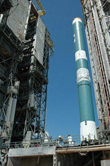 The mobile service tower approaches the Delta II rocket The mobile service tower approaches the Delta II rocket