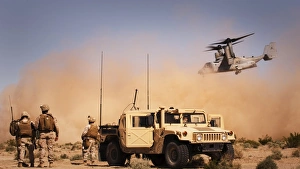 A MV-22 Osprey makes its way to the landing zone to pick up soldiers A MV-22 Osprey makes its way to the landing zone to pick up soldiers