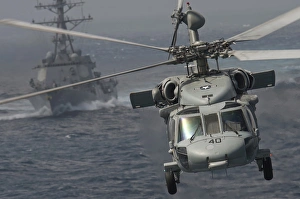 n MH-60S Knight Hawk delivers supplies to USS Carl Vinson n MH-60S Knight Hawk delivers supplies to USS Carl Vinson