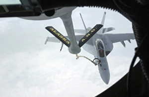 A Navy F/A-18F Super Hornet is refueled by a KC-135R Stratotanker A Navy F/A-18F Super Hornet is refueled by a KC-135R Stratotanker